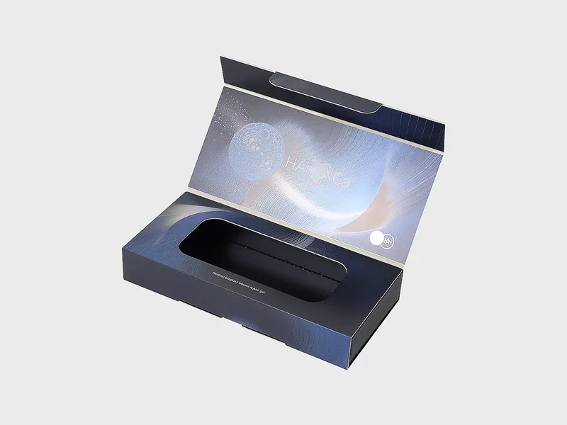 Flip-top rigid box opened at an angle, showing the printed inner lid and the molded insert inside