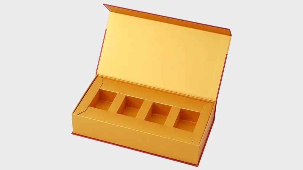Open gold supplement box packaging featuring a five-compartment insert on a white background